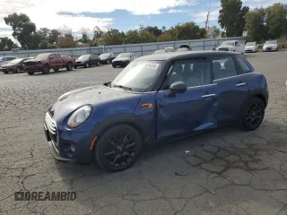 2015 MINI Hardtop 4 Door z VIN WMWXS5C5XFT831166, wystawiony jako Copart lot #78248204 z przebiegiem 69 459 mil mil oraz Szkoda całkowita • Salvage title. Historia ofert i sprzedaży dostępna na DreamBid. Obrazek 1.