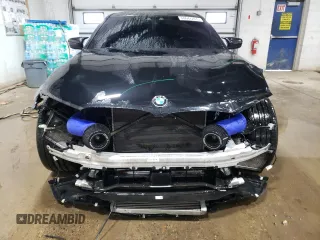 2018 BMW M5 z VIN WBSJF0C51JB282271, wystawiony jako Copart lot #60647265 z przebiegiem 63 765 mil mil oraz Szkoda całkowita • Salvage title. Historia ofert i sprzedaży dostępna na DreamBid. Obrazek 5.