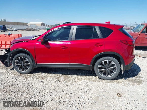 2016 Mazda CX-5 Grand Touring with VIN JM3KE2DYXG0652017, listed as a IAAI auction lot 42041158 with 95,946 mi miles and . Bid and sale history available at DreamBid. Image 14.