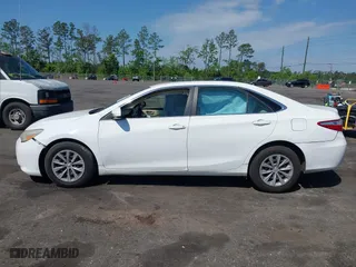 2015 Toyota Camry XLE with VIN 4T1BF1FK6FU948938, listed as a IAAI auction lot 42023487 with 107,232 mi miles. Bid and sale history available at carsss.com. Image 14.