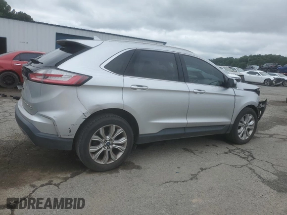 2019 Ford Edge Titanium с VIN 2FMPK3K95KBB22694, выставлен на аукционе Copart как лот 58660475 с пробегом 144 615 миль миль и Списание • Salvage title. История ставок и продаж доступна на DreamBid. Изображение 3.
