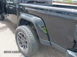 2023 Jeep Gladiator High Altitude z VIN 1C6HJTFG5PL552826, wystawiony jako IAAI lot #42288319 z przebiegiem 55 165 mil mil oraz . Historia ofert i sprzedaży dostępna na DreamBid. Obrazek 6.
