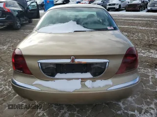 1999 Lincoln Continental with VIN 1LNHM97V2XY644250, listed as a Copart auction lot 82440454 with 196,568 mi miles and Clean Title. Bid and sale history available at carsss.com. Image 6.