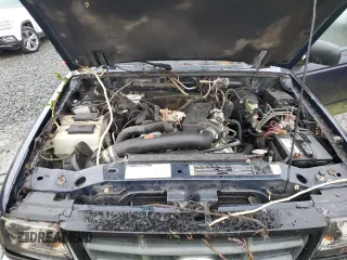 2002 Ford Ranger with VIN 1FTZR15U32PA09526, listed as a Copart auction lot 41525445 with 207,677 mi miles and Clean Title. Bid and sale history available at DreamBid. Image 11.