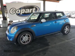 2007 MINI Hardtop S z VIN WMWMF73587TL91078, wystawiony jako Copart lot #65798545 z przebiegiem 118 513 mil mil oraz Czysty tytuł • Clean title. Historia ofert i sprzedaży dostępna na DreamBid. Obrazek 1.