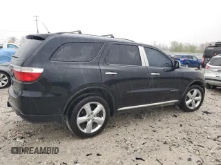2013 Dodge Durango Citadel with VIN 1C4SDJET0DC616002, listed as a Copart auction lot 54677325 with 174,131 mi miles and Salvage title. Bid and sale history available at DreamBid. Image 3.