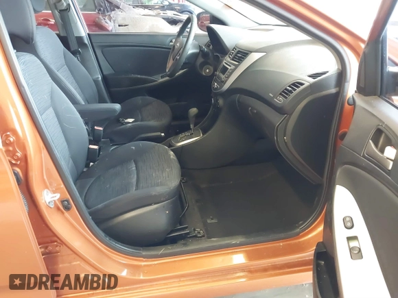 2015 Hyundai Accent GS with VIN KMHCT5AE6FU211955, listed as a IAAI auction lot 41610857 with 106,497 mi miles. Bid and sale history available at carsss.com. Image 5.