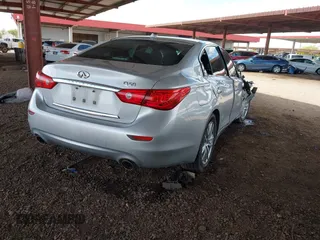 2015 Infiniti Q50 Premium with VIN JN1BV7AP9FM333610, listed as a IAAI auction lot 42029779 with 168,740 mi miles. Bid and sale history available at carsss.com. Image 4.