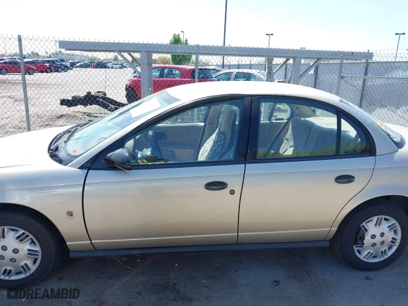 1996 Saturn SL with VIN 1G8ZH5288TZ230864, listed as a IAAI auction lot 42116703 with 104,387 mi miles. Bid and sale history available at carsss.com. Image 6.
