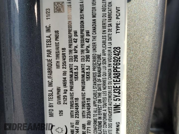2023 Tesla Model 3 with VIN 5YJ3E1EA8PF692428, listed as a Copart auction lot 64667414 with 16,704 mi miles and Salvage Title. Bid and sale history available at DreamBid. Image 12.