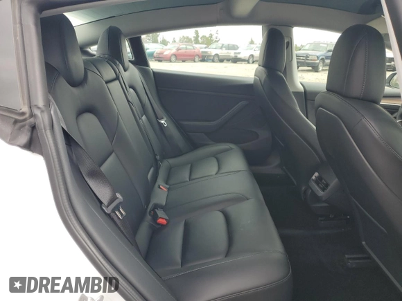 2021 Tesla Model 3 Standard Range Plus with VIN 5YJ3E1EA7MF087909, listed as a Copart auction lot 50942395 with 16,591 mi miles and Salvage Title. Bid and sale history available at carsss.com. Image 10.
