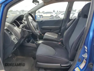 2007 Honda Fit Sport with VIN JHMGD38687S014318, listed as a Copart auction lot 53992935 with 59,504 mi miles and Clean title. Bid and sale history available at DreamBid. Image 7.