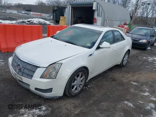 2009 Cadillac CTS AWD w/1SA with VIN 1G6DG577990169317, listed as a IAAI auction lot 41450158 with 144,768 mi miles. Bid and sale history available at carsss.com. Image 2.