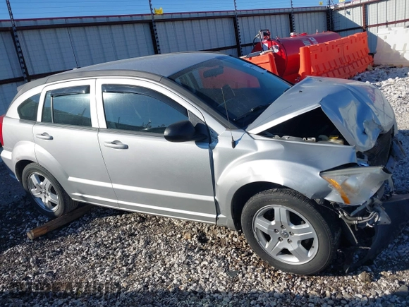 2009 Dodge Caliber SXT with VIN 1B3HB48A99D143067, listed as a IAAI auction lot 40989643 with 132,534 mi miles and . Bid and sale history available at carsss.com. Image 14.