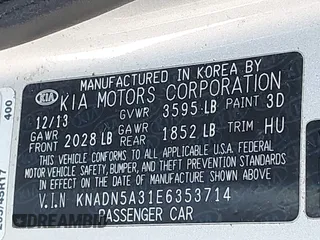 2014 Kia Rio SX with VIN KNADN5A31E6353714, listed as a IAAI auction lot 42127657 with 117,544 mi miles. Bid and sale history available at carsss.com. Image 9.