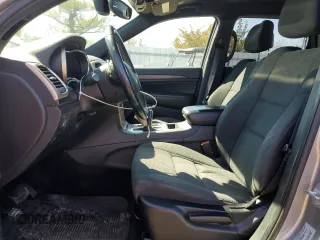 2017 Jeep Grand Cherokee Altitude z VIN 1C4RJFAG1HC656897, wystawiony jako Copart lot #49494305 z przebiegiem 145 254 mil mil oraz Szkoda całkowita • Salvage title. Historia ofert i sprzedaży dostępna na DreamBid. Obrazek 7.