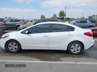 2015 Kia Forte LX with VIN KNAFX4A69F5421840, listed as a IAAI auction lot 42019236 with 147,847 mi miles. Bid and sale history available at carsss.com. Image 14.