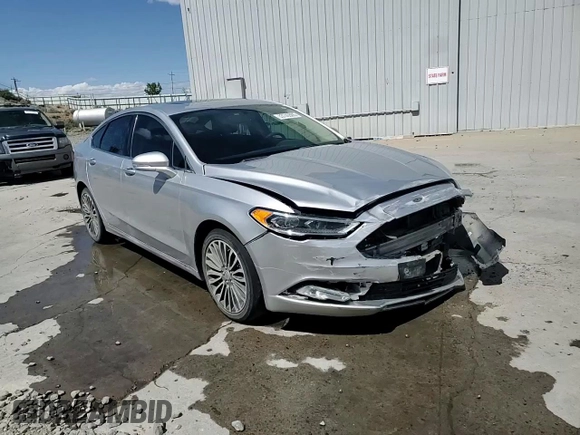 2018 Ford Fusion Titanium z VIN 3FA6P0D96JR155318, wystawiony jako Copart lot #53740505 z przebiegiem 86 567 mil mil oraz Szkoda całkowita • Salvage title. Historia ofert i sprzedaży dostępna na DreamBid. Obrazek 13.