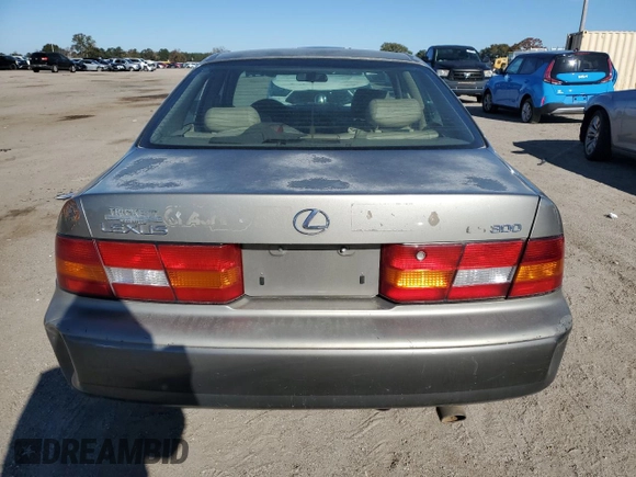 1997 Lexus ES 300 Luxury Sport Sdn with VIN JT8BF22GXV0055087, listed as a Copart auction lot 83823814 with 208,967 mi miles and Salvage Title. Bid and sale history available at carsss.com. Image 6.