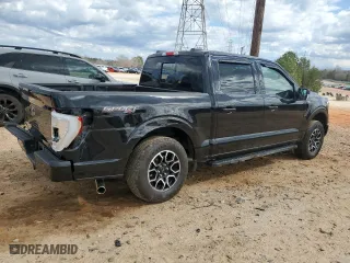 2023 Ford F-150 XL with VIN 1FTFW1E59PKE02763, listed as a Copart auction lot 49326355 with 26,674 mi miles and Salvage Title. Bid and sale history available at carsss.com. Image 3.