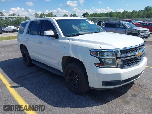 2018 Chevrolet Tahoe Commercial z VIN 1GNLCDEC1JR155210, wystawiony jako IAAI lot #42845068 z przebiegiem 159 456 mil mil oraz . Historia ofert i sprzedaży dostępna na DreamBid. Obrazek 1.
