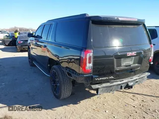 2019 GMC Yukon XL SLT with VIN 1GKS1GKC3KR380153, listed as a IAAI auction lot 41360225 with 152,304 mi miles. Bid and sale history available at carsss.com. Image 3.