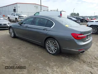 2017 BMW 7 Series 740i with VIN WBA7E2C54HG740170, listed as a IAAI auction lot 41432578 with 110,893 mi miles and . Bid and sale history available at DreamBid. Image 3.