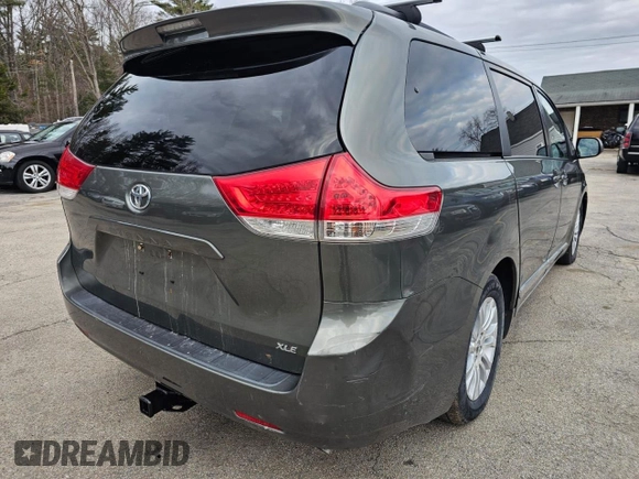 2011 Toyota Sienna XLE AAS with VIN 5TDYK3DCXBS099901, listed as a Copart auction lot 51174615 with 131,795 mi miles and Clean Title. Bid and sale history available at carsss.com. Image 4.