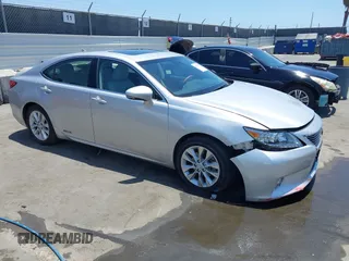 2014 Lexus ES 300h with VIN JTHBW1GG3E2048571, listed as a IAAI auction lot 42559478 with 48,225 mi miles and . Bid and sale history available at DreamBid. Image 1.