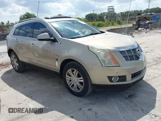 2012 Cadillac SRX Luxury Collection z VIN 3GYFNAE3XCS541830, wystawiony jako IAAI lot #42299792 z przebiegiem 145 448 mil mil oraz . Historia ofert i sprzedaży dostępna na DreamBid. Obrazek 1.