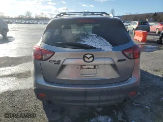 2013 Mazda CX-5 Grand Touring with VIN JM3KE4DE3D0138832, listed as a Copart auction lot 87681935 with 133,836 mi miles and Salvage Title. Bid and sale history available at carsss.com. Image 6.