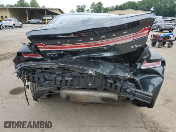 2015 Lincoln MKZ с VIN 3LN6L2JK3FR607012, выставлен на аукционе Copart как лот 60605655 с пробегом 87 347 миль миль и Списание • Salvage title. История ставок и продаж доступна на DreamBid. Изображение 6.
