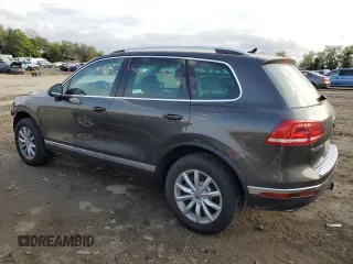 2017 Volkswagen Touareg Sport with VIN WVGEF7BP0HD005996, listed as a Copart auction lot 72883304 with 66,167 mi miles and Salvage Title. Bid and sale history available at DreamBid. Image 2.