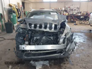 2015 Jeep Cherokee Limited with VIN 1C4PJLDB0FW505891, listed as a IAAI auction lot 41620674 with 120,804 mi miles and . Bid and sale history available at DreamBid. Image 12.