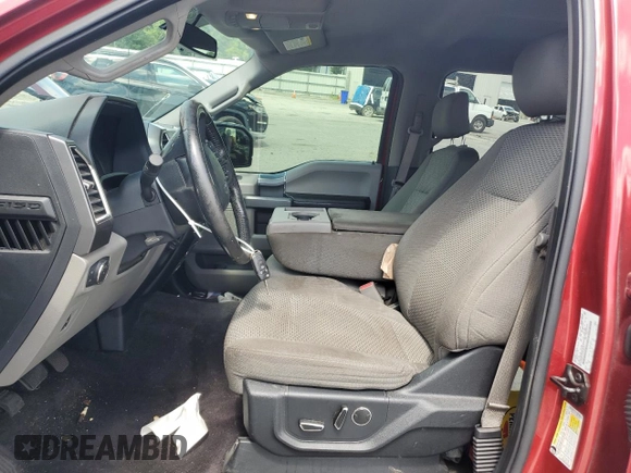 2015 Ford F-150 XL with VIN 1FTEW1CF2FKE96734, listed as a Copart auction lot 61216835 with 77,726 mi miles and Salvage title. Bid and sale history available at DreamBid. Image 7.