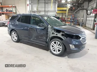 2019 Chevrolet Equinox Premier z VIN 3GNAXNEVXKS500672, wystawiony jako IAAI lot #42042922 z przebiegiem 77 440 mil mil oraz . Historia ofert i sprzedaży dostępna na DreamBid. Obrazek 1.