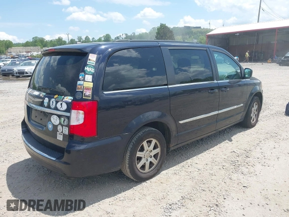 2011 Chrysler Town & Country Touring with VIN 2A4RR5DG7BR697932, listed as a IAAI auction lot 42231254 with 151,866 mi miles and . Bid and sale history available at DreamBid. Image 4.