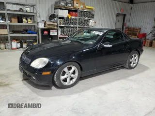 2003 Mercedes-Benz SLK 320 with VIN WDBKK65F23F277574, listed as a Copart auction lot 82523004 with 112,143 mi miles and Clean title. Bid and sale history available at DreamBid. Image 1.