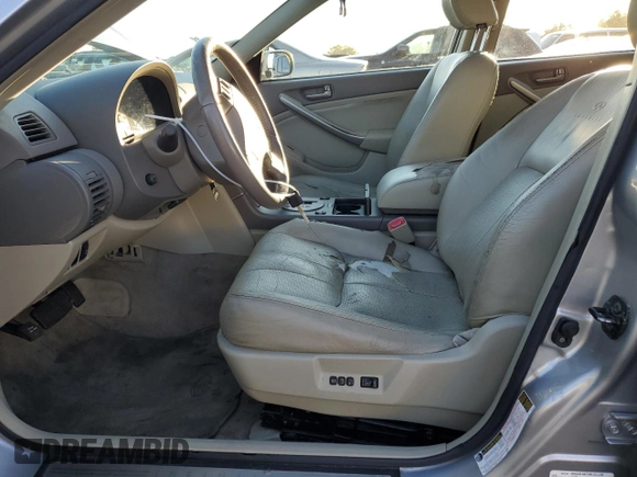 2004 Infiniti G35 w/Leather with VIN JNKCV51F74M702599, listed as a Copart auction lot 75554534 with 122,353 mi miles and Clean Title. Bid and sale history available at DreamBid. Image 7.