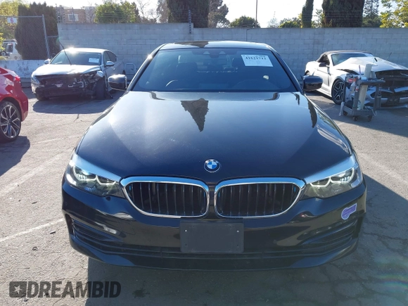 2019 BMW 5 Series 530e iPerformance with VIN WBAJA9C53KB388861, listed as a IAAI auction lot 41621712 with 68,128 mi miles. Bid and sale history available at carsss.com. Image 12.