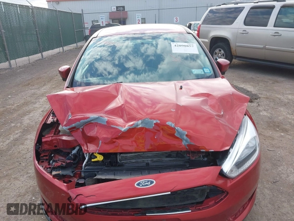 2018 Ford Focus SE with VIN 1FADP3FE6JL318552, listed as a IAAI auction lot 42090857 with 81,624 mi miles. Bid and sale history available at carsss.com. Image 12.