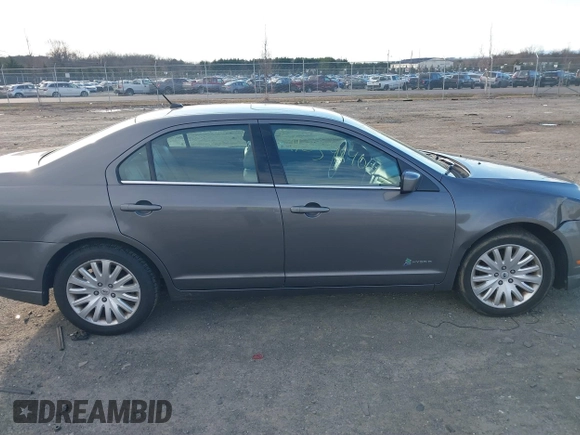 2011 Ford Fusion Hybrid with VIN 3FADP0L35BR316361, listed as a IAAI auction lot 41234840 with 168,768 mi miles and . Bid and sale history available at DreamBid. Image 13.
