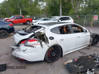 2016 Porsche Panamera 4 z VIN WP0AA2A78GL006176, wystawiony jako IAAI lot #41987545 z przebiegiem Nie podano mil oraz . Historia ofert i sprzedaży dostępna na DreamBid. Obrazek 4.