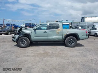 2023 Toyota Tacoma 4WD SR with VIN 3TYCZ5AN7PT145185, listed as a IAAI auction lot 41658297 with 23,647 mi miles. Bid and sale history available at carsss.com. Image 14.