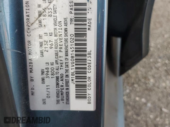 2011 Mazda 3 i Touring with VIN JM1BL1VG0B1451020, listed as a Copart auction lot 55887435 with Not Provided miles and Salvage Title. Bid and sale history available at DreamBid. Image 13.
