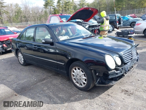 2000 Mercedes-Benz E-Class with VIN WDBJF82J2YX037818, listed as a IAAI auction lot 41910044 with 163,240 mi miles. Bid and sale history available at carsss.com. Image 1.