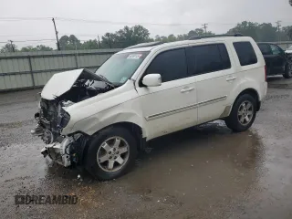 2011 Honda Pilot Touring z VIN 5FNYF3H92BB044575, wystawiony jako Copart lot #55268145 z przebiegiem Nie podano mil oraz Szkoda całkowita • Salvage title. Historia ofert i sprzedaży dostępna na DreamBid. Obrazek 1.