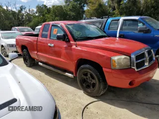 2006 Dodge Dakota SLT z VIN 1D7HE42N76S510319, wystawiony jako Copart lot #75268694 z przebiegiem Nie podano mil oraz Nie do naprawy • Non repairable. Historia ofert i sprzedaży dostępna na DreamBid. Obrazek 4.