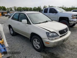 1999 Lexus RX 300 with VIN JT6HF10U7X0009824, listed as a Copart auction lot 52953135 with 180,006 mi miles and Salvage Title. Bid and sale history available at DreamBid. Image 4.