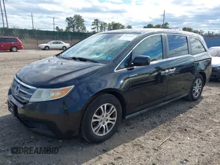2011 Honda Odyssey EX with VIN 5FNRL5H4XBB011918, listed as a IAAI auction lot 42056043 with 201,821 mi miles and . Bid and sale history available at carsss.com. Image 18.